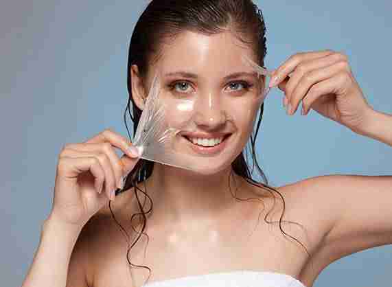 woman taking off the chemical peel